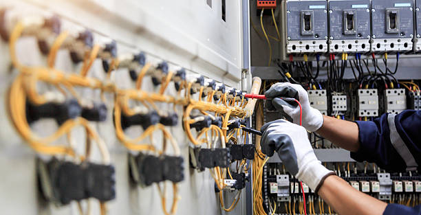 Professional Electrician technician working in Luck, WI